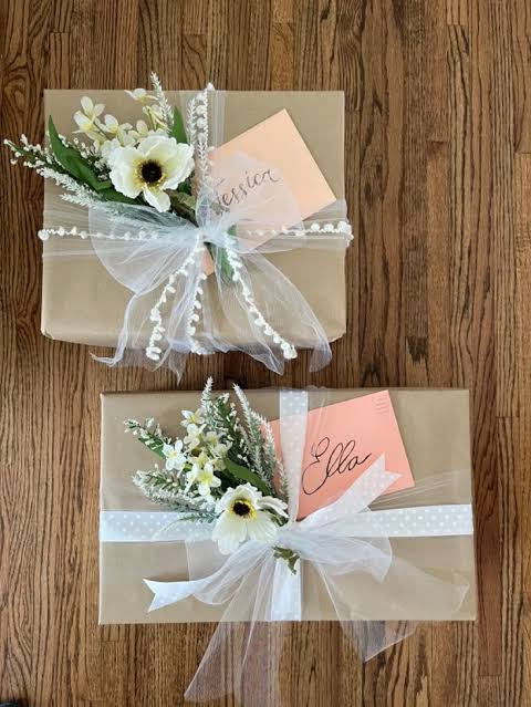 Gift wrapped bridal accessories in blush and ivory tones